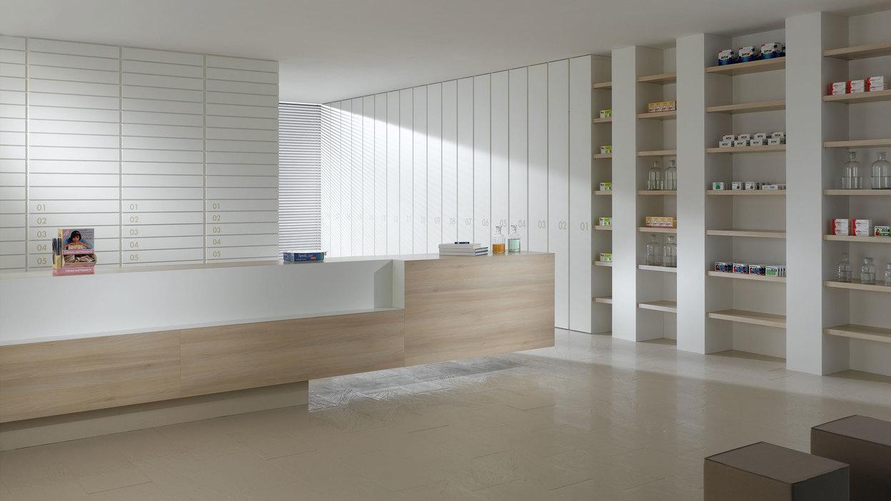 Impressionen einer Apothekeneinrichtung mit hellen Holzmöbeln und geräumigem Regalsystem, sowie aufgeräumten Empfang.